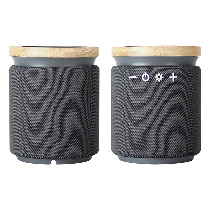 Bamboo Wireless Speaker & Charger charging a smartphone, promotional charger in use