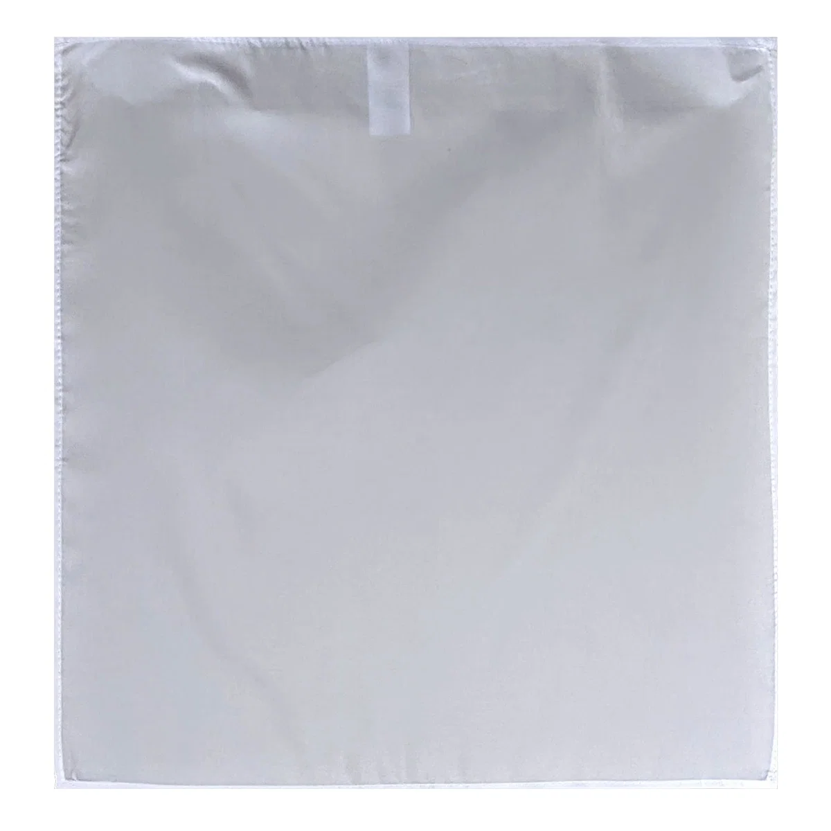 Bandana folded into a triangle on a plain surface