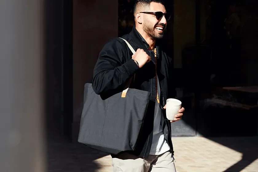 Bellroy Market Tote with Water Bottle Pocket being worn
