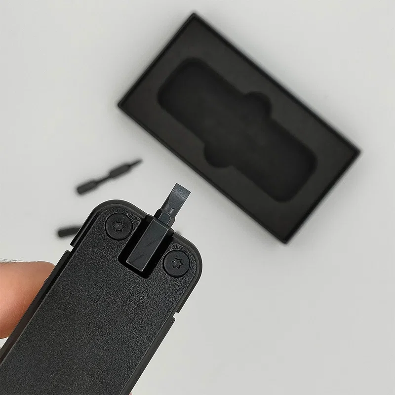 Branded Best Buddy Tools 16-in-1 multi-tool in hand for scale, lifestyle shot