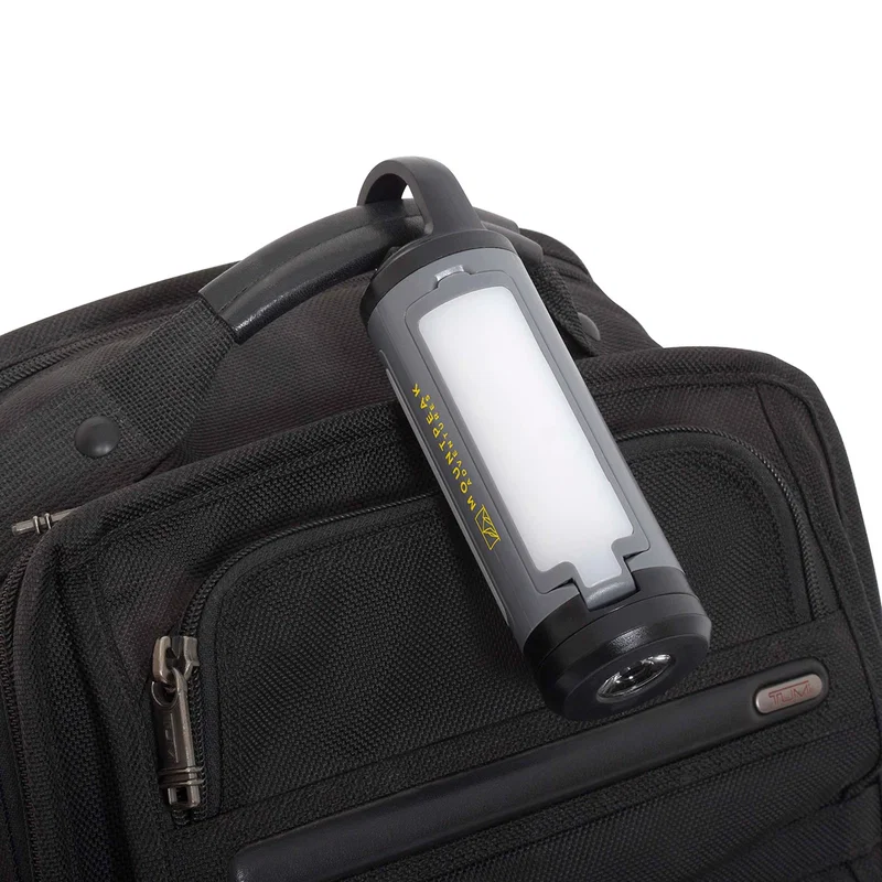 Close-up of the Best Buddy Tools LED light illuminated in low light