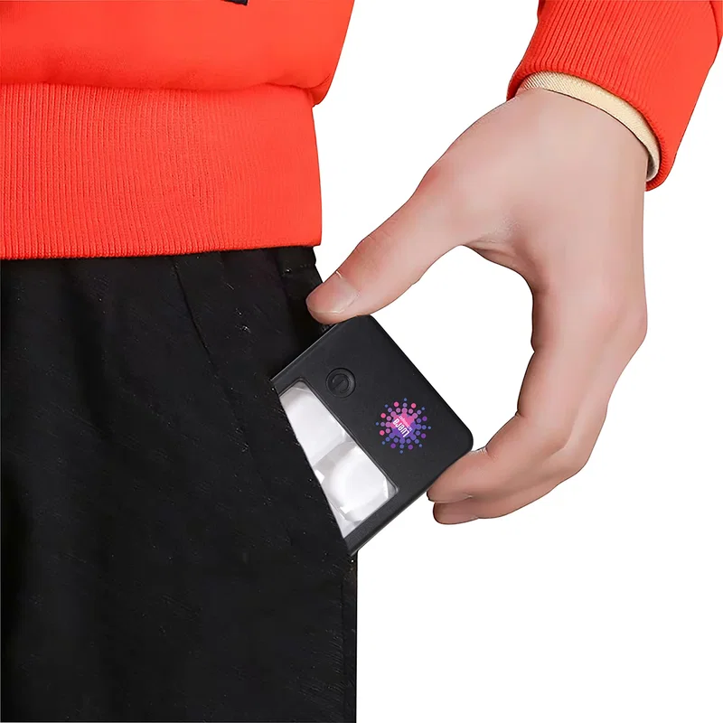 Angled view of the Best Buddy Tools Pocket Magnifier showing the lit LED light