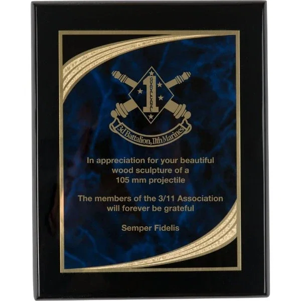 Black piano-finish award plaque with lasered blue and gold marble-design plate