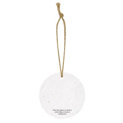 Circular plantable disc measuring two and a half inches