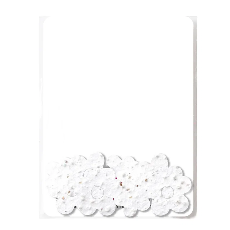 Loose plantable confetti shapes poured out of the pouch