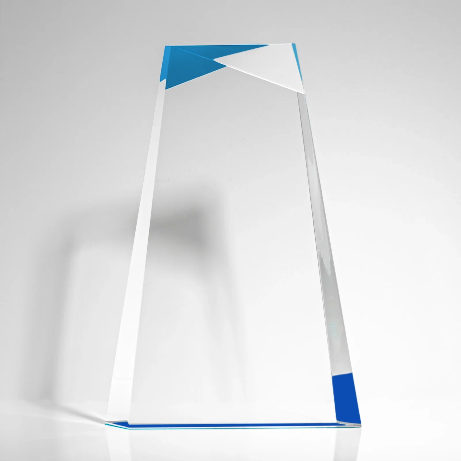 Custom Hand-Cut Facet Acrylic Tower Award on Mirrored Blue Base for dealer and partner awards