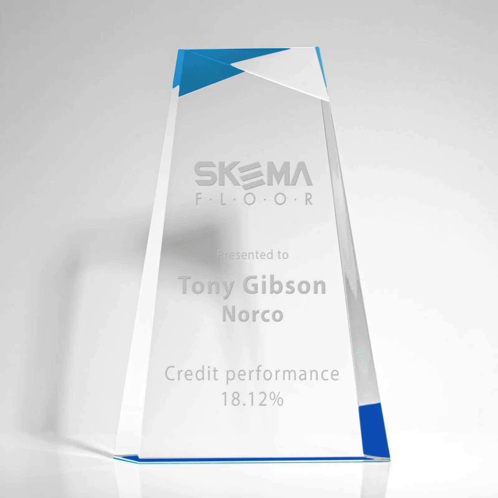 Custom Hand-Cut Facet Acrylic Tower Award on Mirrored Blue Base for sales achievement awards