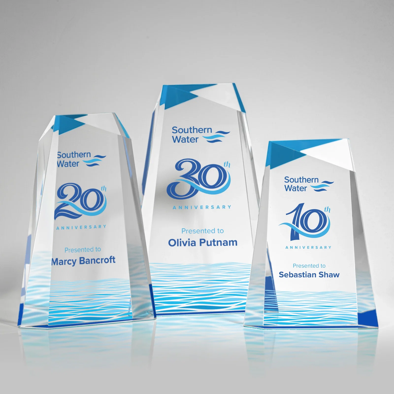 Custom Hand-Cut Facet Acrylic Tower Award on Mirrored Blue Base for retirement presentations