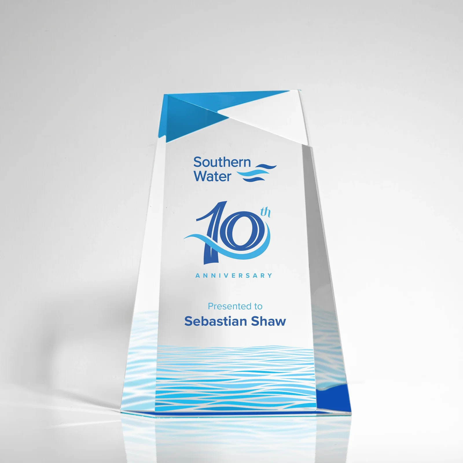 Custom Hand-Cut Facet Acrylic Tower Award on Mirrored Blue Base for team milestone celebrations