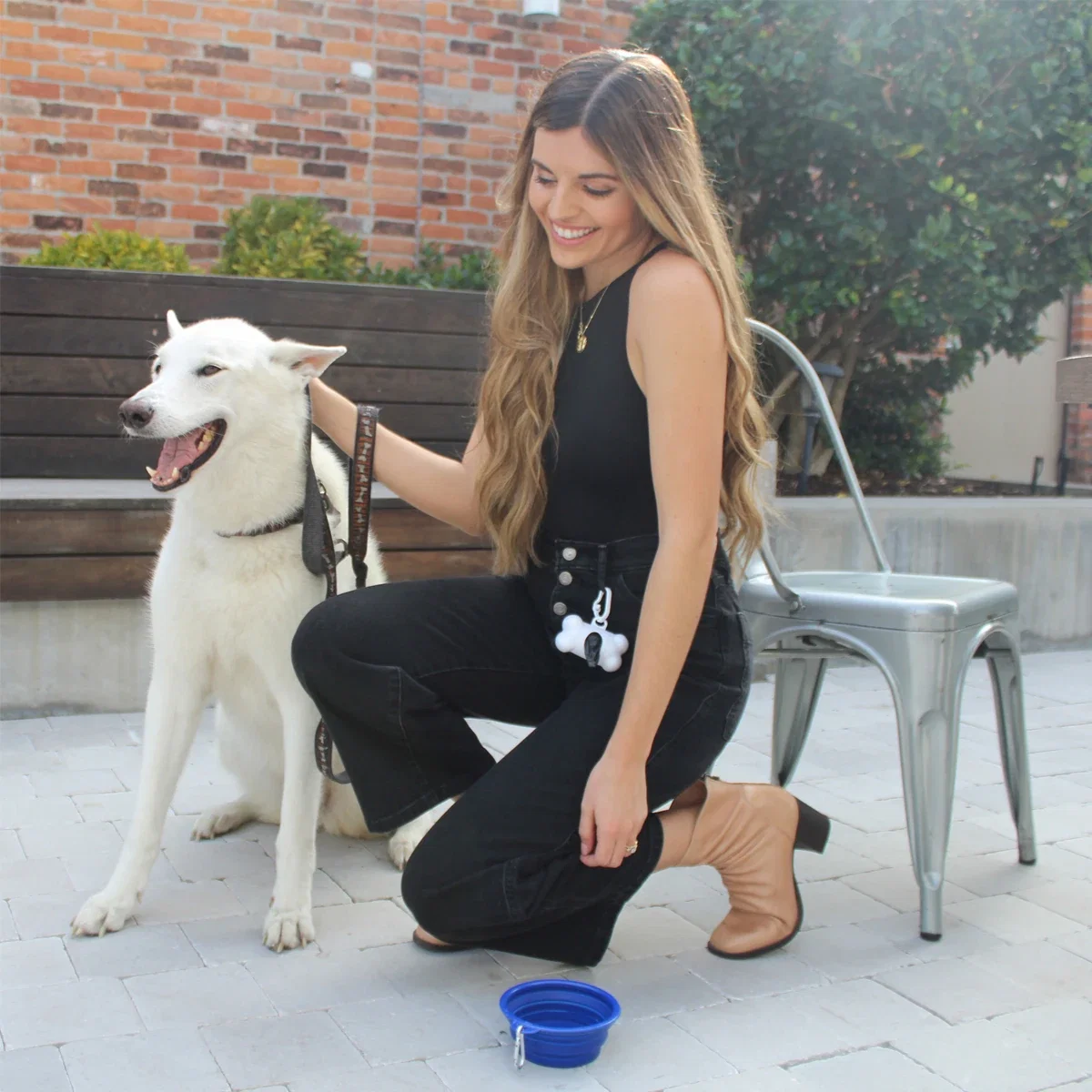 Bone Shaped Dog Bag Dispenser being worn