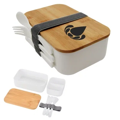 Compartments filled with a packed lunch ready to go