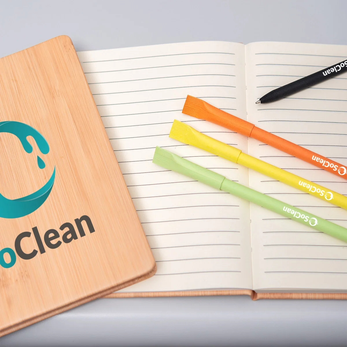 Journal held in one hand while taking notes