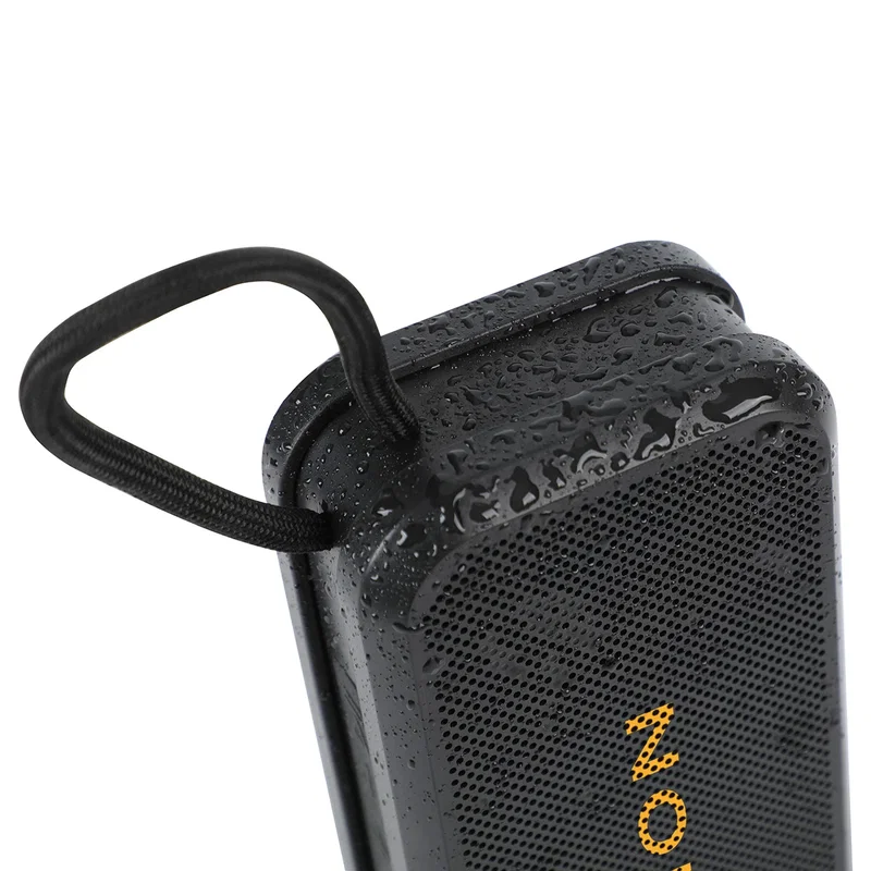 Bravo Waterproof Wireless Speaker attached to a locker door, gym-use lifestyle shot of the branded speaker
