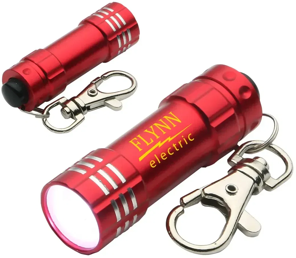 Custom Bright Shine keychain flashlight lit showing three LEDs, branded giveaway angled view
