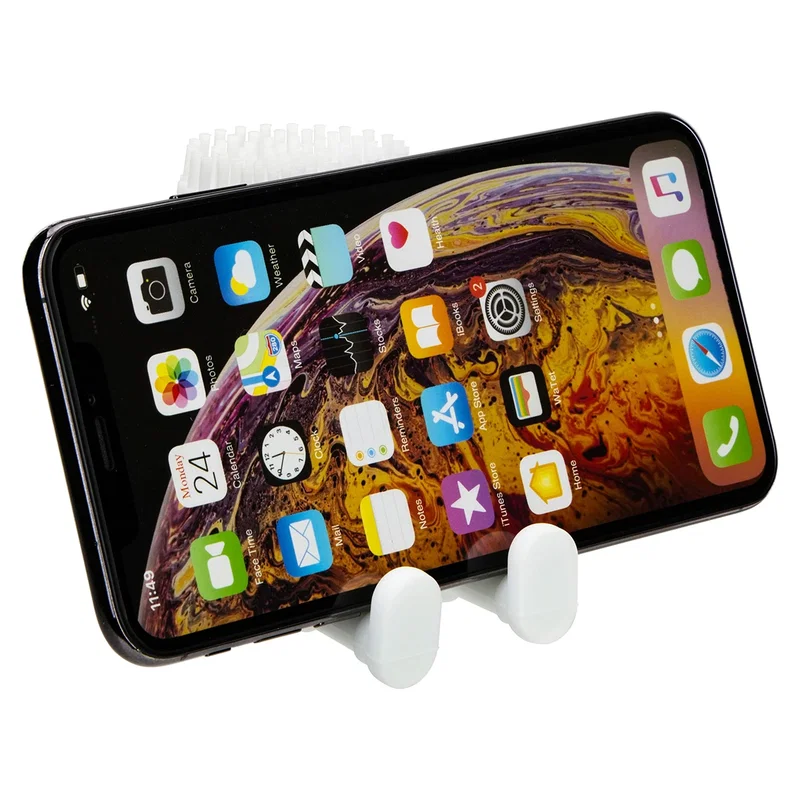 Bristle Buddy phone stand shown folded into its compact travel form