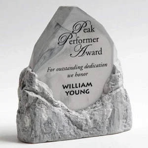 White Carrara Marble Obelisk Rising From a Mountain Base