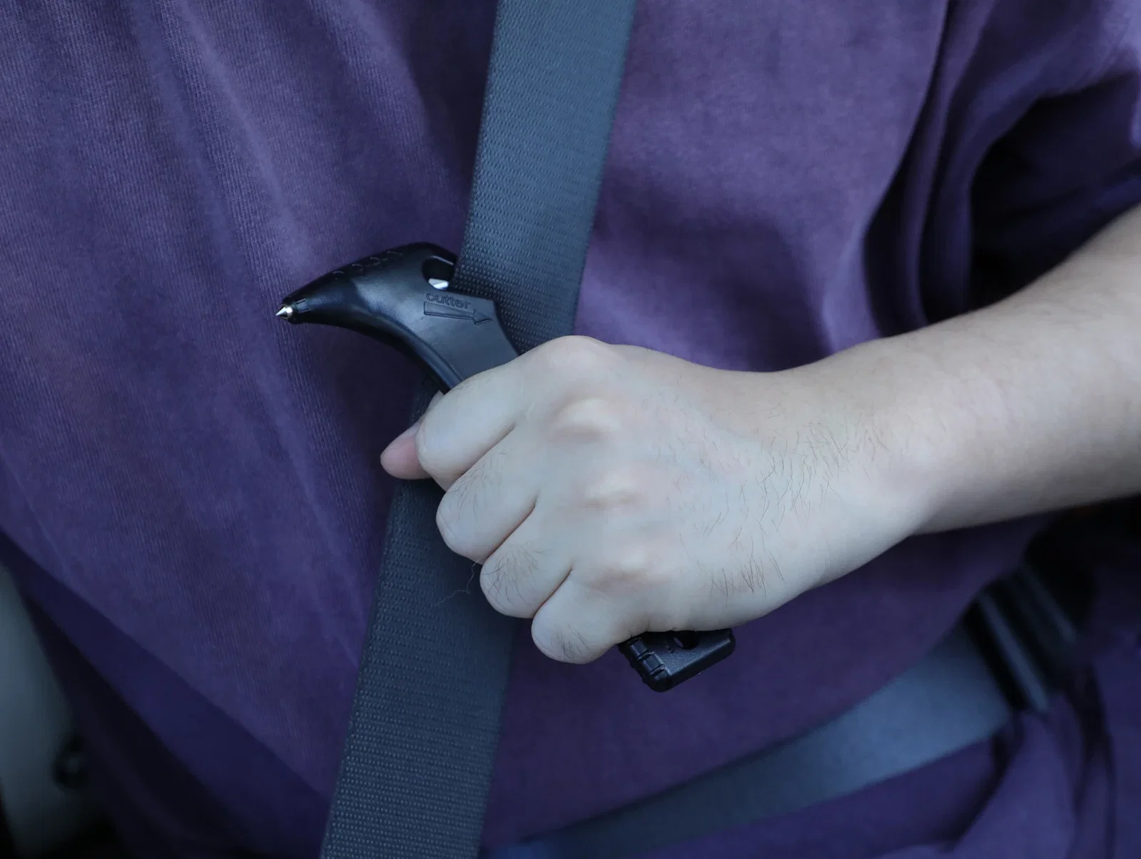Close-up of the Car Escape Tool with Cutter's window-breaking hammer point