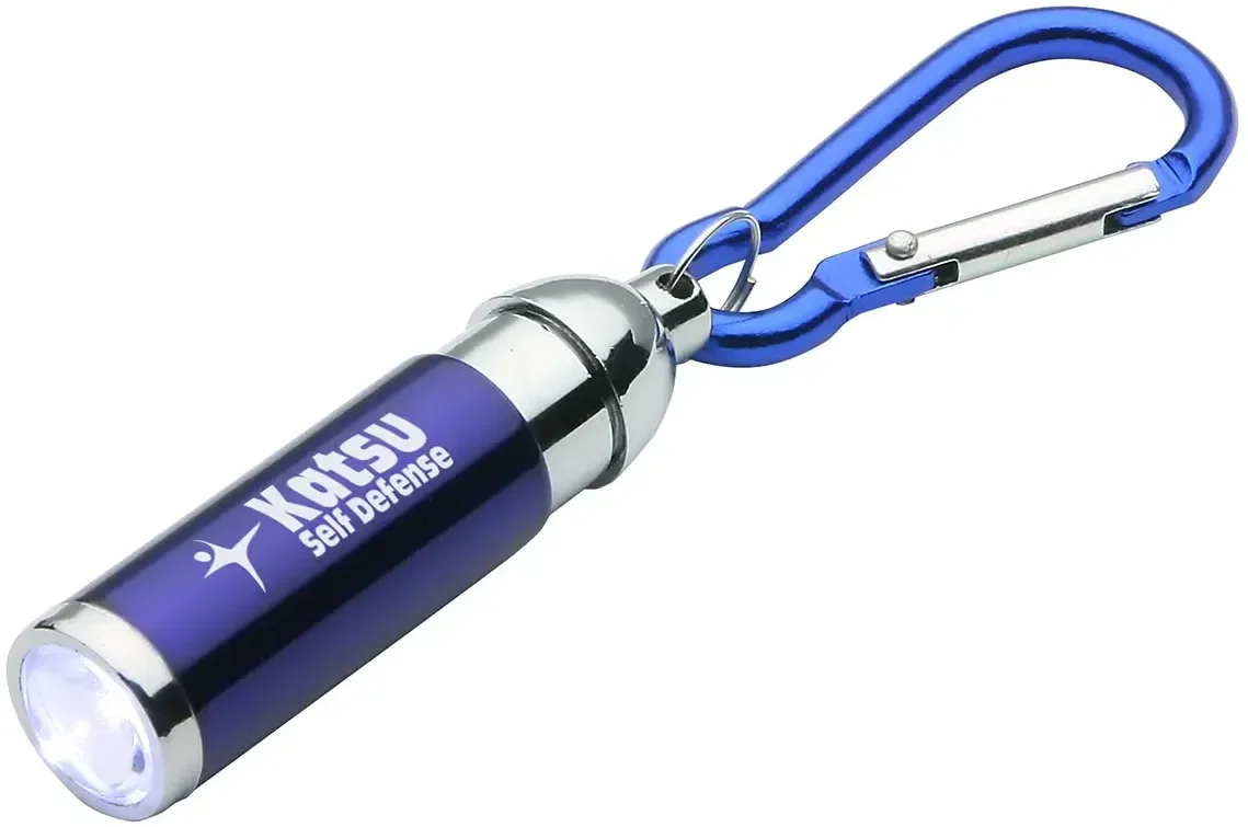 Promotional Carabiner clip LED keychain light clipped to a bag, side view