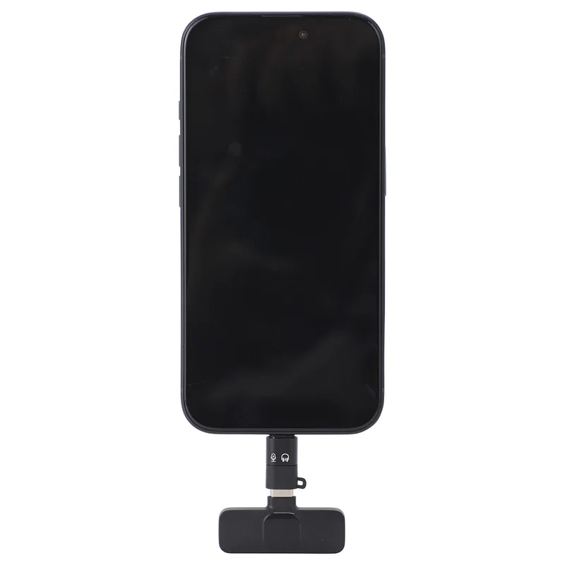 Center Stage Wireless Lavalier Microphone clipped to a shirt collar, in-use lifestyle shot