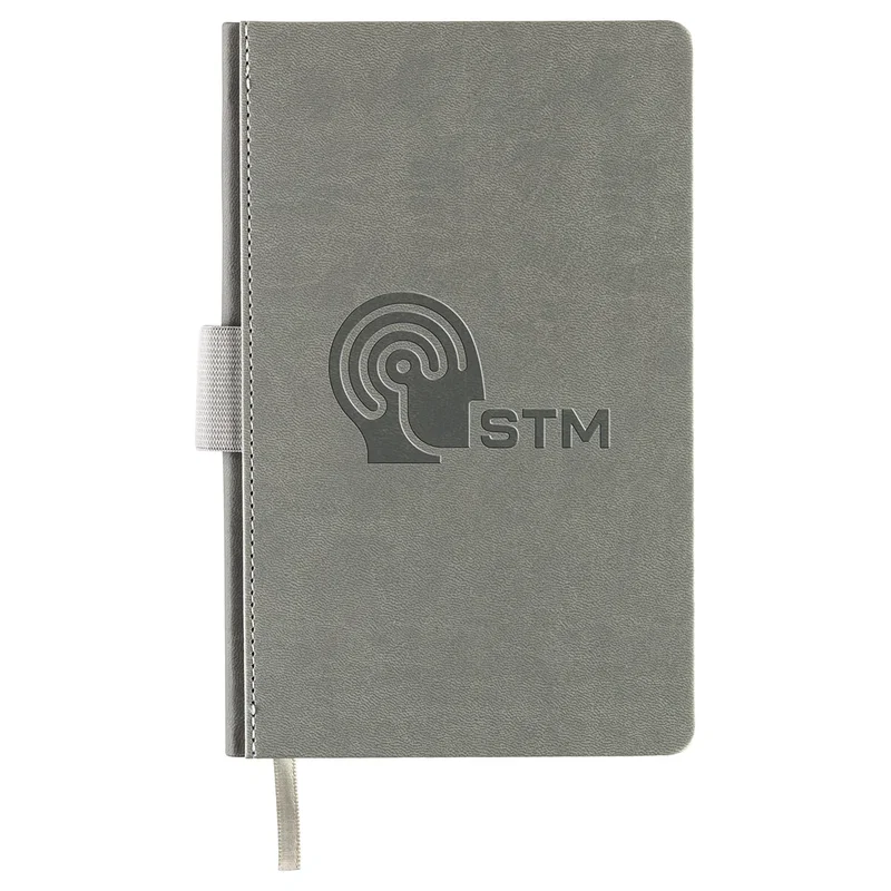 Close-up of the custom Chairman Journal's textured hardcover and pen loop