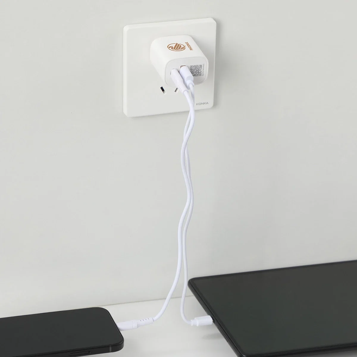 Branded Channel wall charger plugged into an outlet, promotional PD charger in use