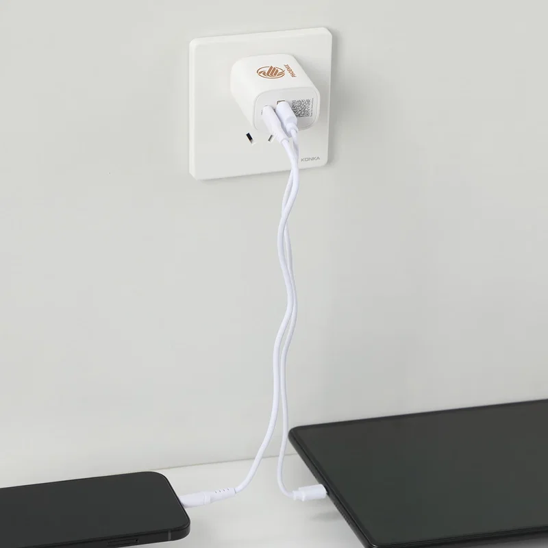 Branded Channel wall charger plugged into an outlet, promotional PD charger in use