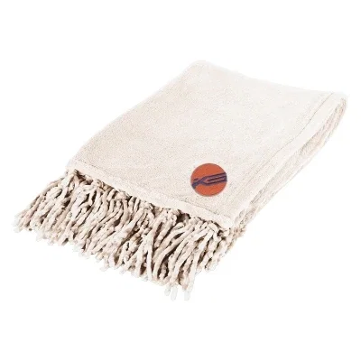 Chenille blanket with fringed ends shown neatly folded