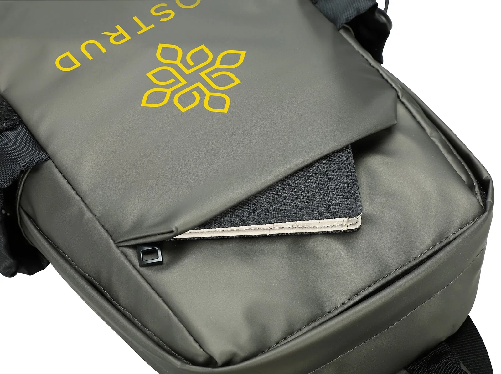 Close-up of the Chateau Leatherette Crossbody Bag's logo imprint area