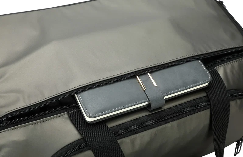 Close-up of the Chateau Duffel's carrying handles and strap
