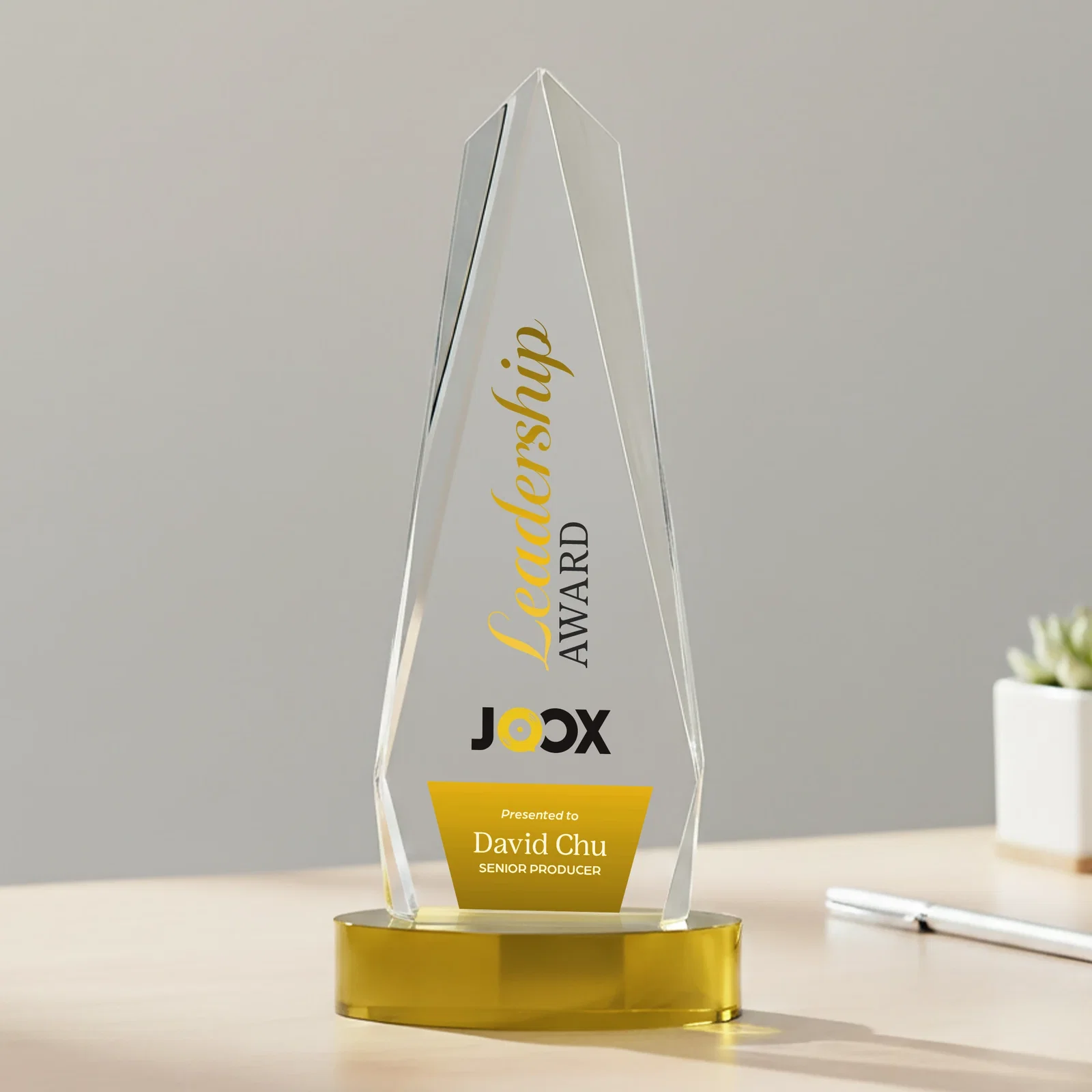 Customized Optical Crystal Tower Award on Oval Base for employee recognition