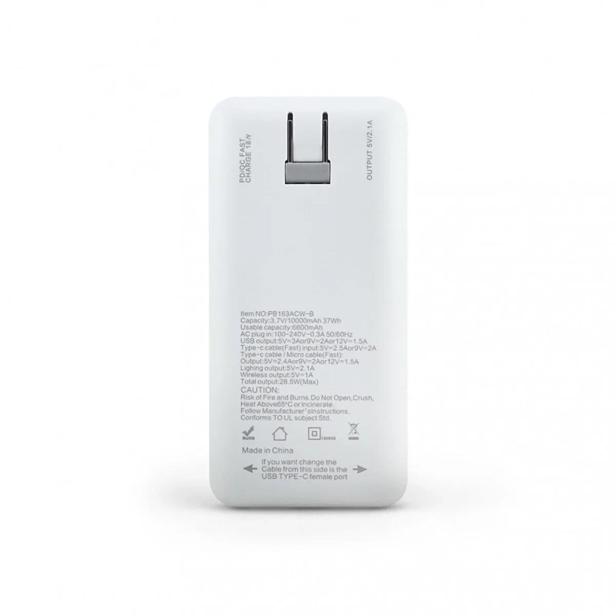 Phone connected to the portable charger while resting on a desk