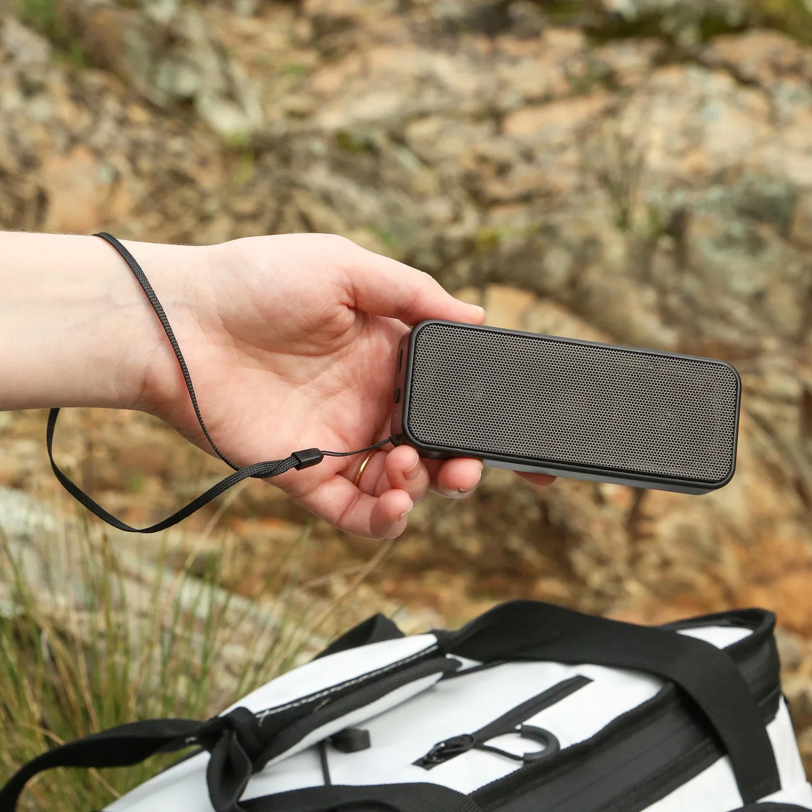 Chillamanjaro™ 12 Can Plateau Cooler Bag held in hand