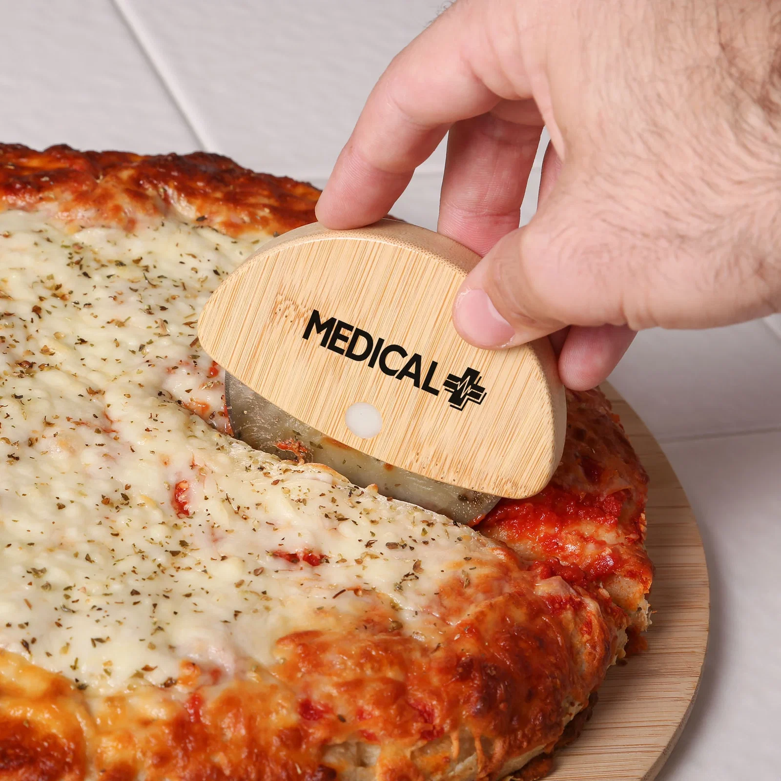 Chun Bamboo Pizza Cutter in use