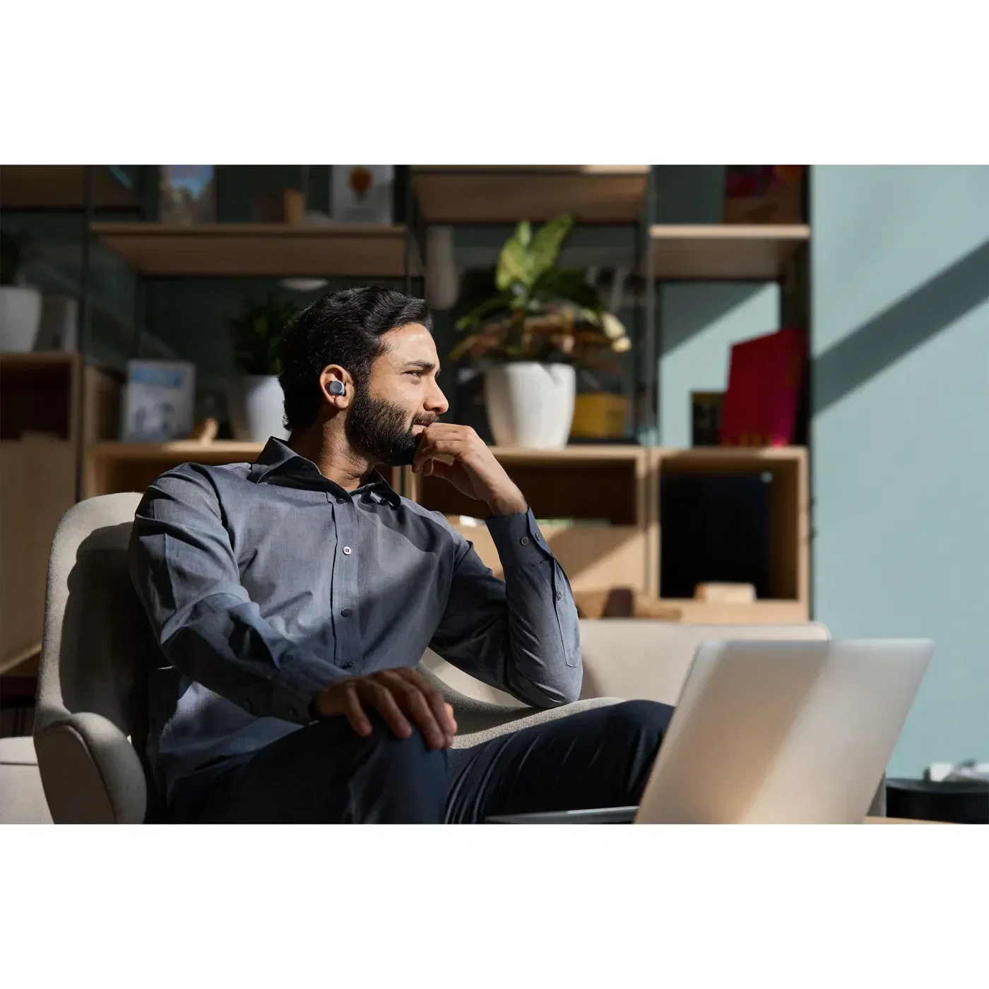 Cleer Ally Plus II True Wireless Noise Cancelling Earbuds being worn