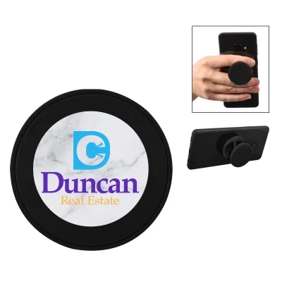 Round collapsible phone grip about one and a half inches wide