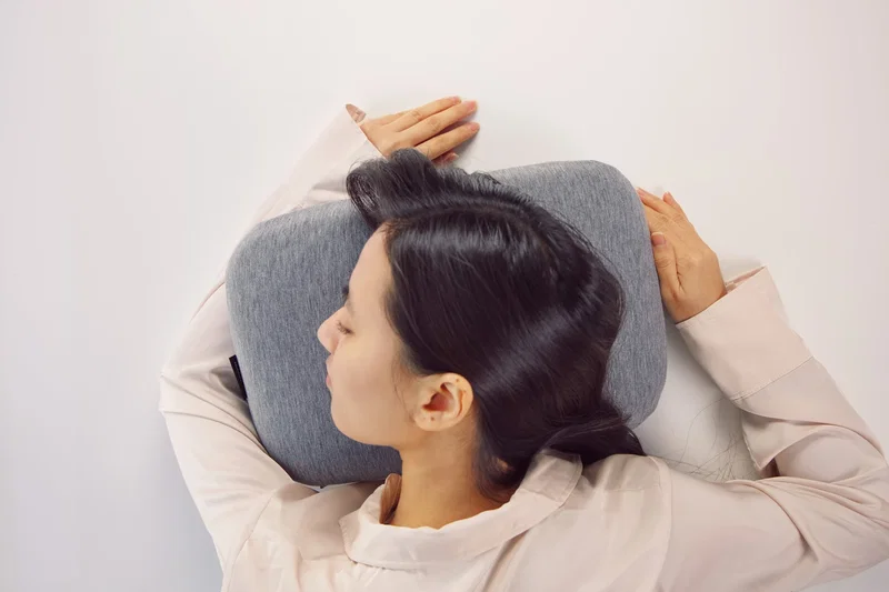 Comfort Logic Everywhere Pillow fully expanded, group shot with packing pouch
