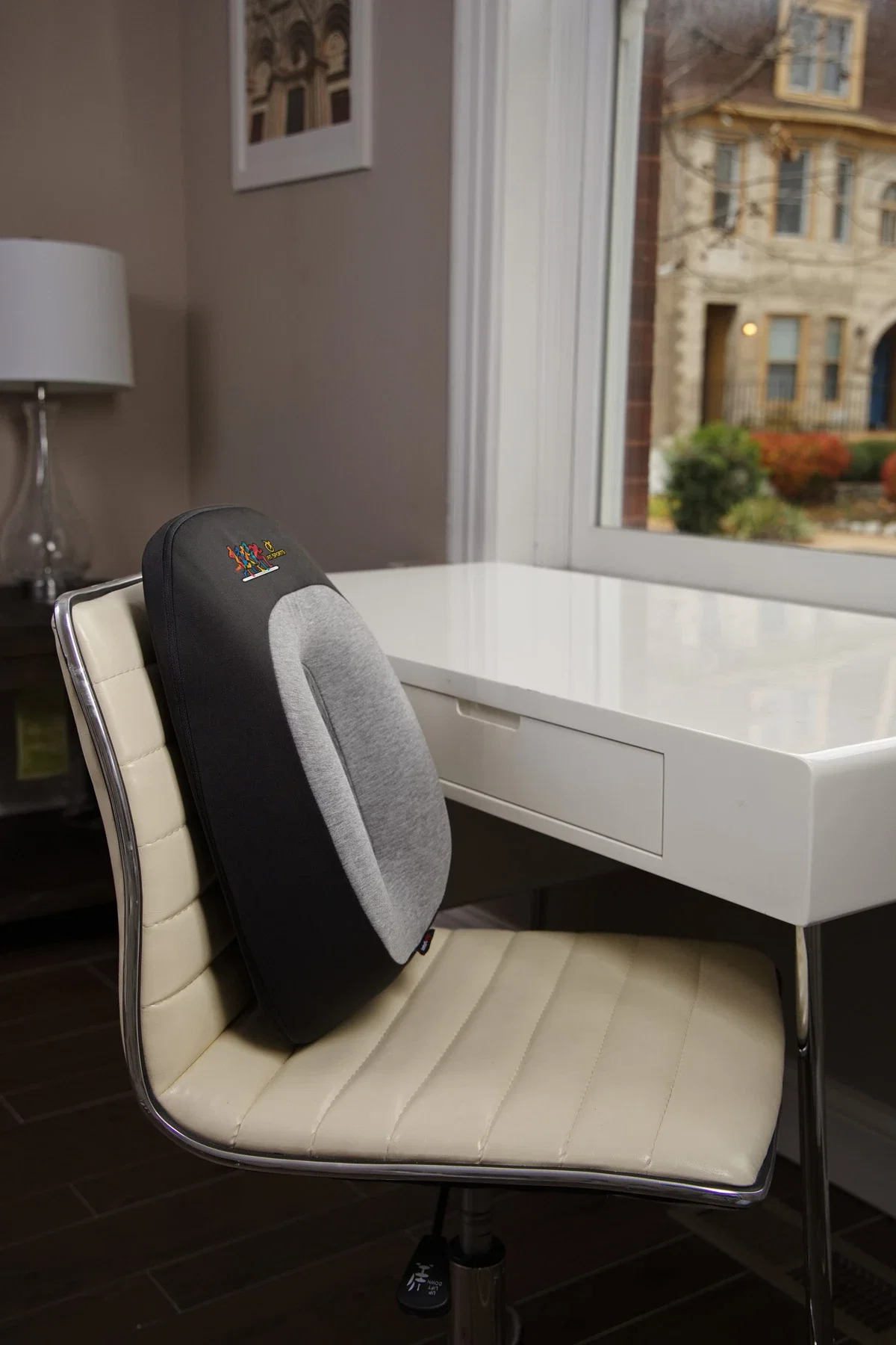 Comfort Logic Heavenly Support Back Pillow in use on an office chair, lifestyle shot