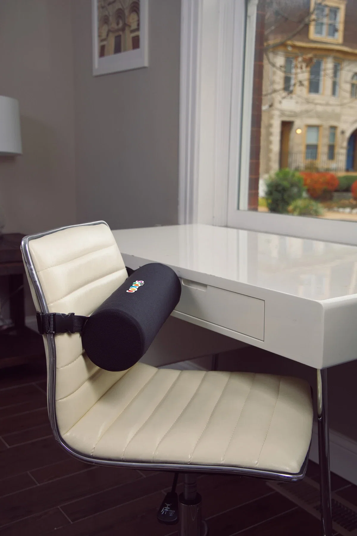 Close-up of the custom Comfort Logic Lumbar Support Roll Pillow's logo imprint area