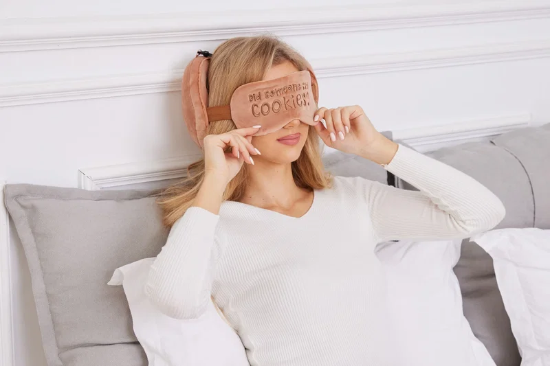 Comfort Pals 2-in-1 Pillow Sleep Mask worn in use as a travel sleep mask, style 4 of 6