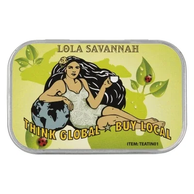 Slim rectangular tea tin measuring under four inches wide, shown closed