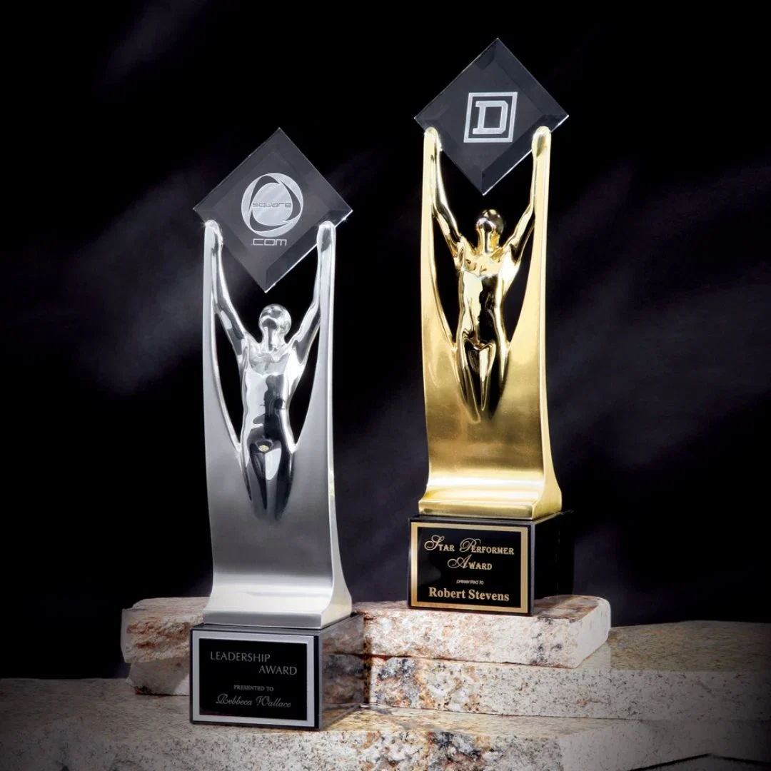 Custom Cast Metal Figure Award Holding a Beveled Starfire Diamond for employee recognition