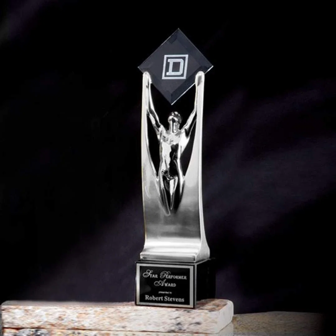 Custom Cast Metal Figure Award Holding a Beveled Starfire Diamond for corporate award ceremonies