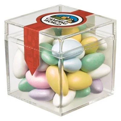 Angled view of the transparent cube revealing the treats inside