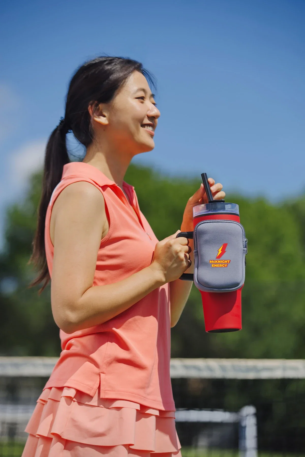 Cup Cadet Zippered Pouch held in hand