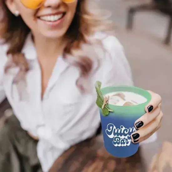 Cups-on-the-Go Color-Changing Stadium Cup (12 oz.) held in hand