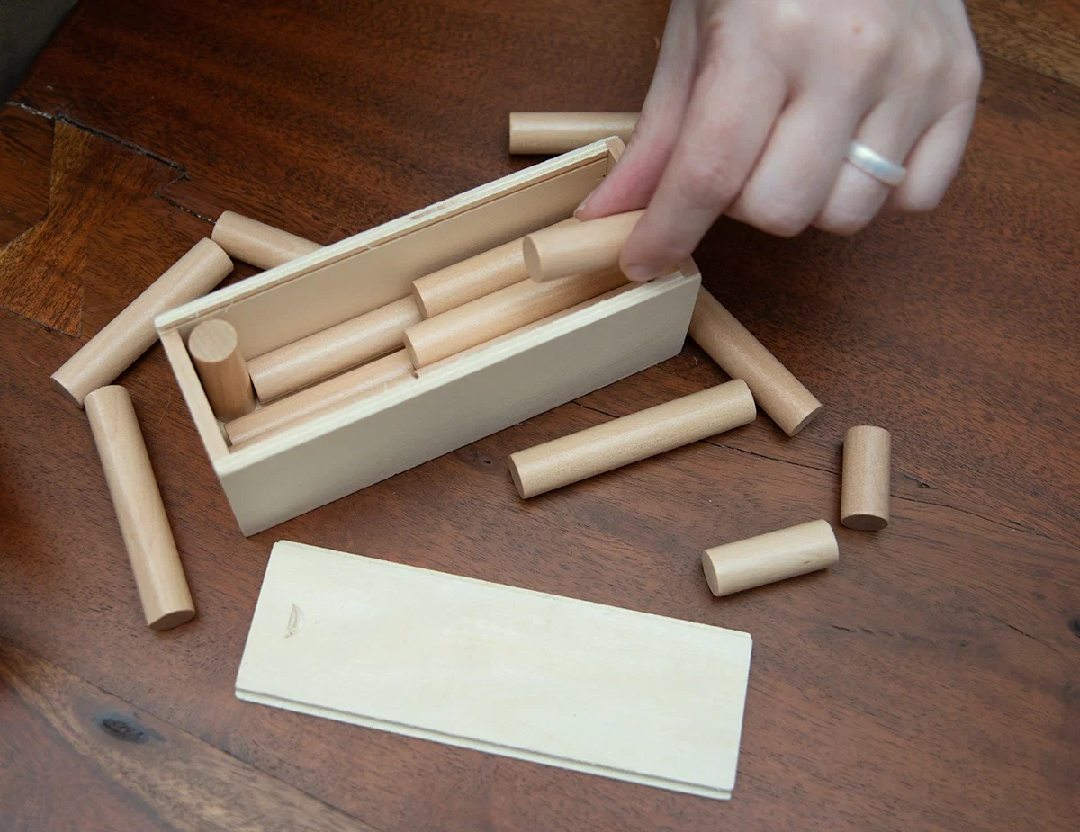 Custom Wooden Log Puzzle held in hand