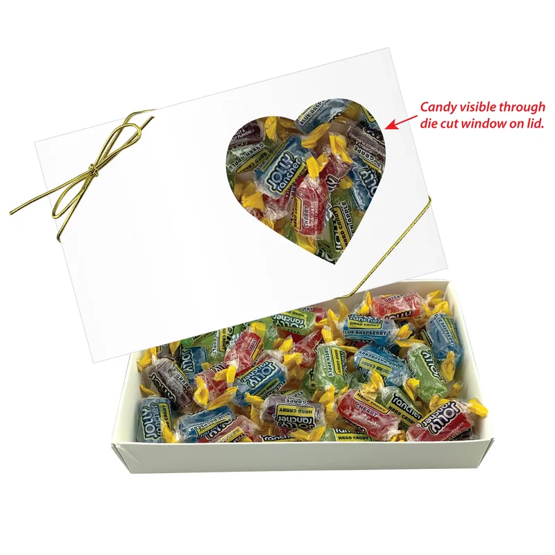 Loose ribbon coiled beside the closed lid
