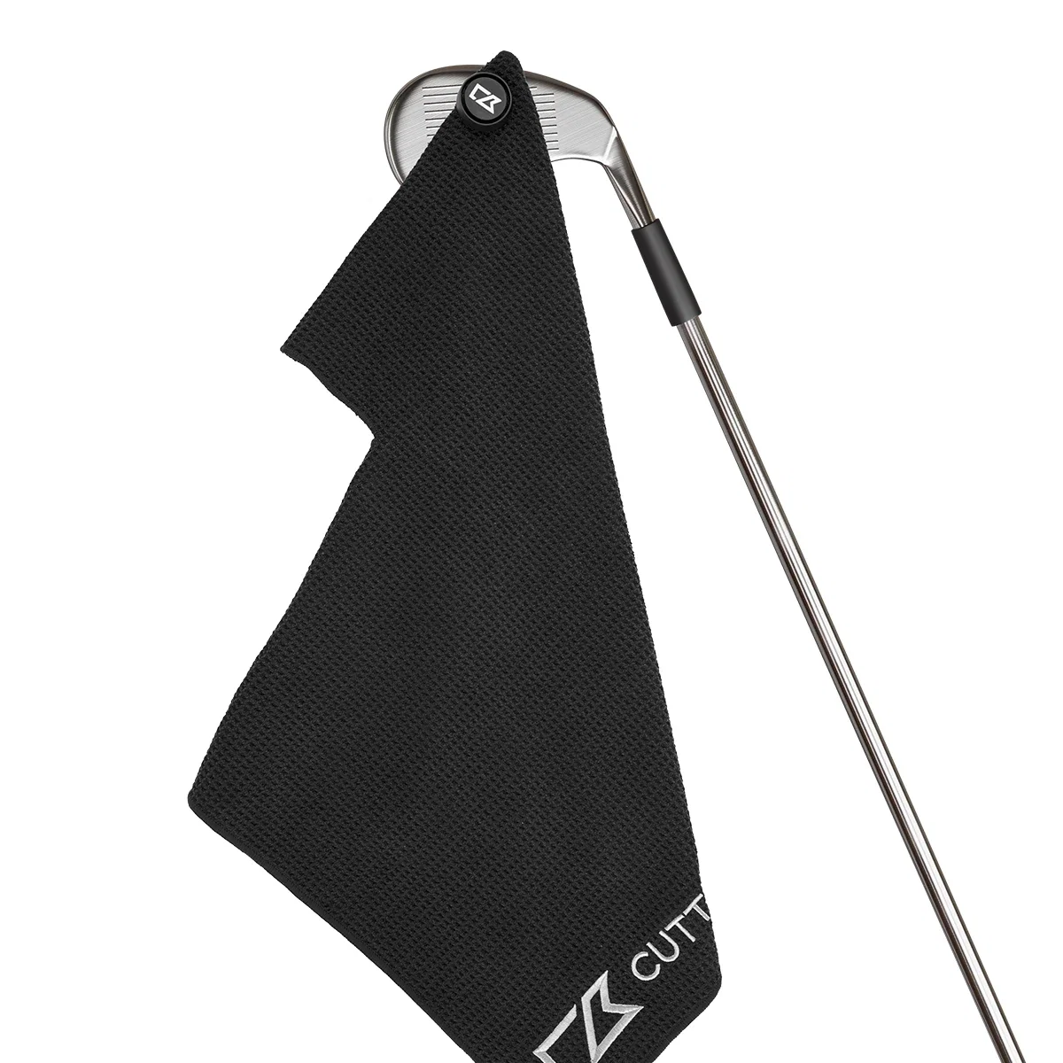 Folded in thirds and hanging from a bag