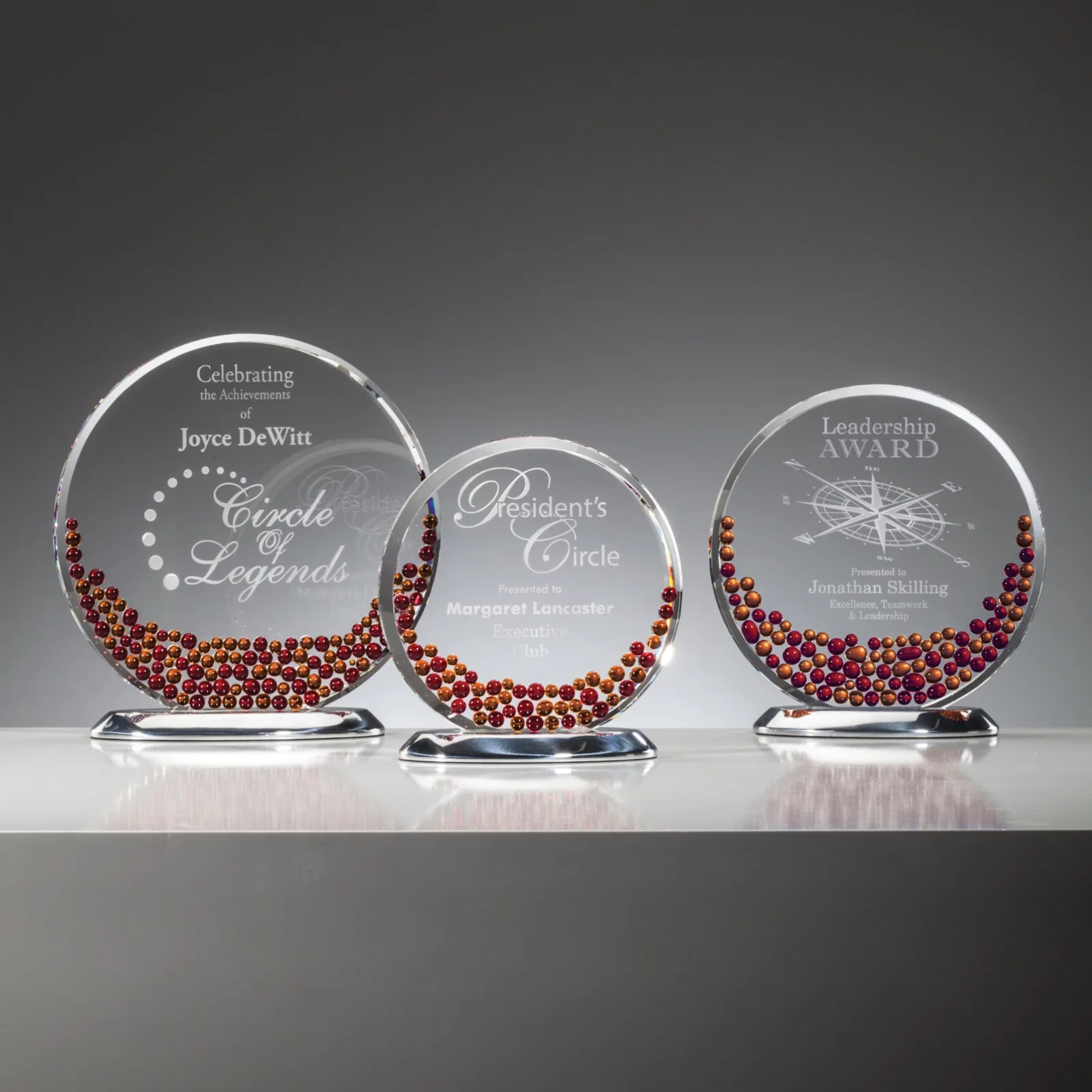Custom Sapphire and Aquamarine Crystal Disc Award With Beads on Both Sides for retirement presentations
