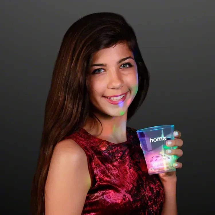 Disco Ball Light Projecting LED Cup held in hand